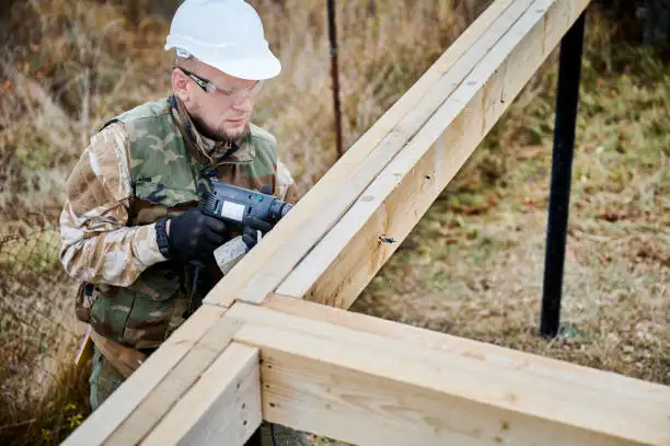 Corrosion-resistant screws, bolts, and connectors for treated wood